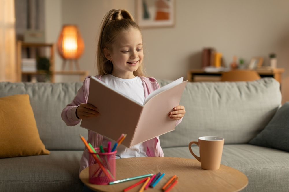 A thoughtful child reading a book representing the development of critical thinking skills through reading comprehension.