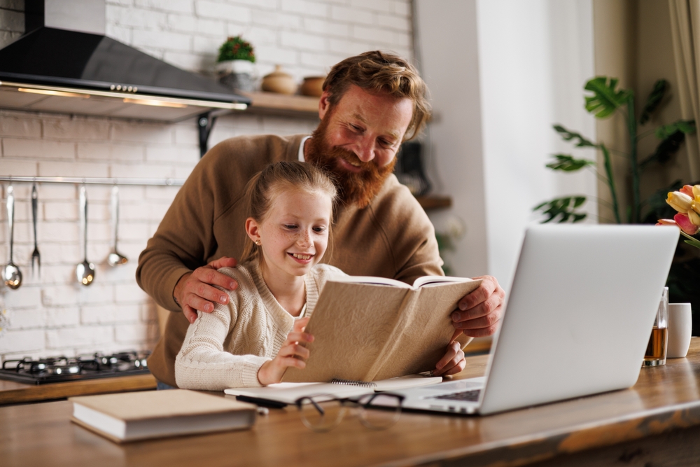 Parent and child using homeschool strategies for reading improvement