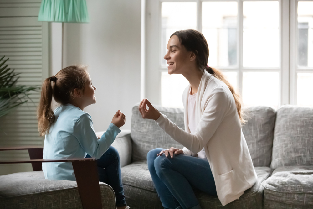 One-on-one cognitive development session demonstrating stages of growth