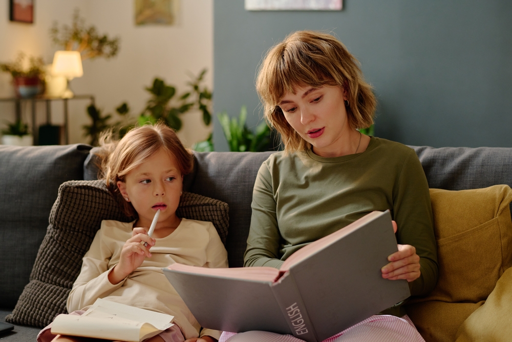 Mother reading to child as part of their daily routine reading for kids, fostering learning and bonding