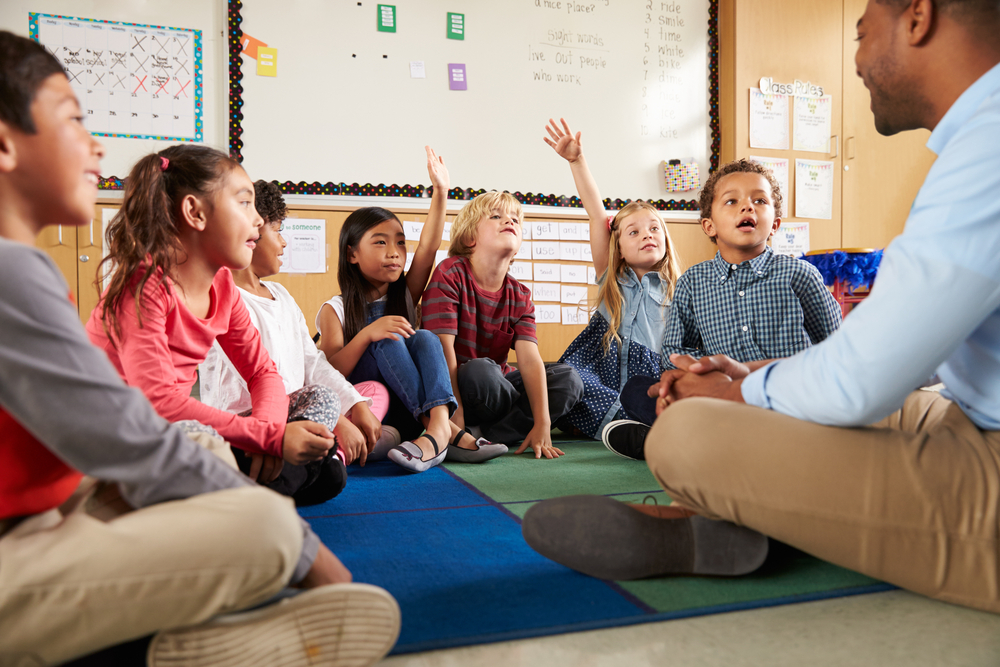 Students participating in a reading comprehension class